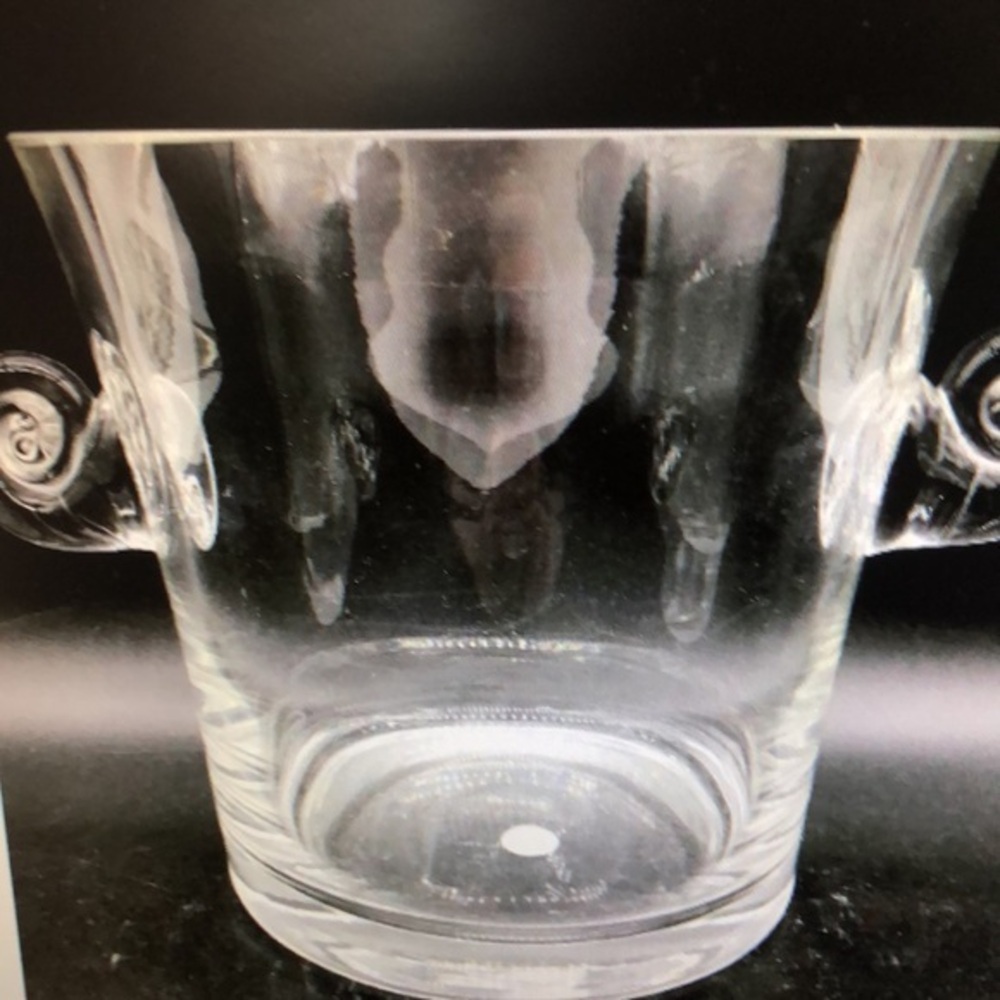 Tiffany & Co scrolled handle ice bucket. Engraved Tiffany & Co. on the‎ bottom